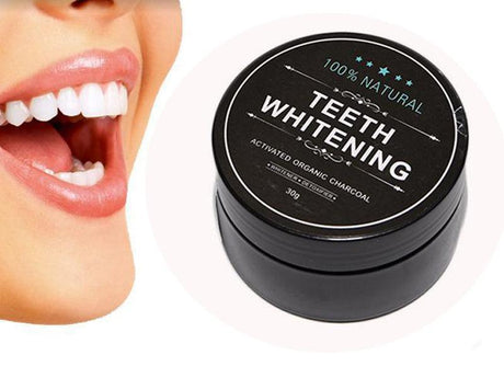 Dientes blancos con Blanqueador Dental de Carbón Activado.